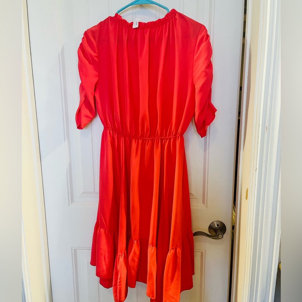 Cute dress new with tags! Lightweight and flowy!